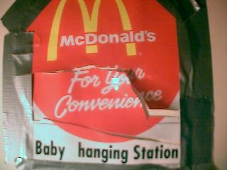 altered baby changing station sign that i stole from mcdonalds